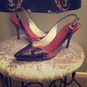 Red/black snakeskin print leather shoes.